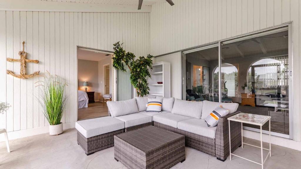 a living room with a couch and a table at GRH11506 - Charlotte Harbor Area - 2 Bed 2 Baths Villa in Punta Gorda Isles