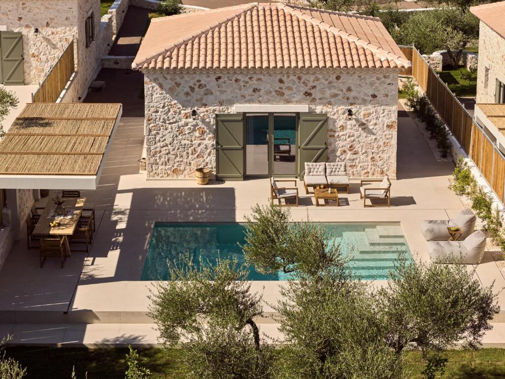 an aerial view of a villa with a swimming pool at Conte Maris V in Tragaki