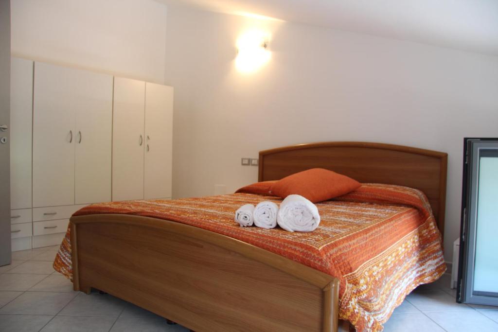 Postel nebo postele na pokoji v ubytování B&B Villa Ermanna