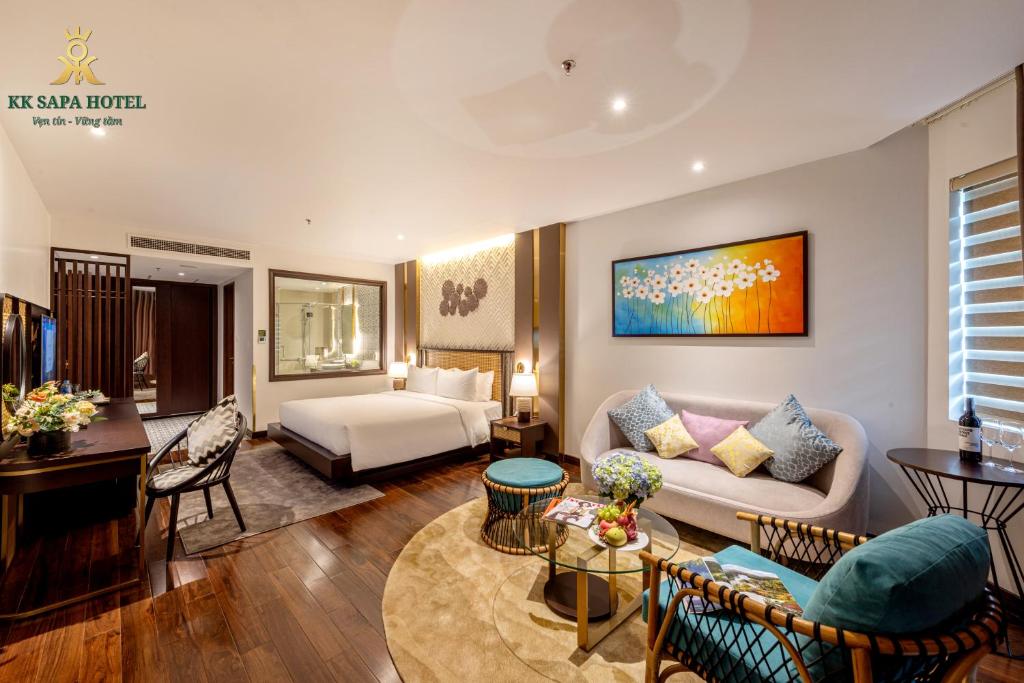 Giường trong phòng chung tại KK Sapa Hotel
