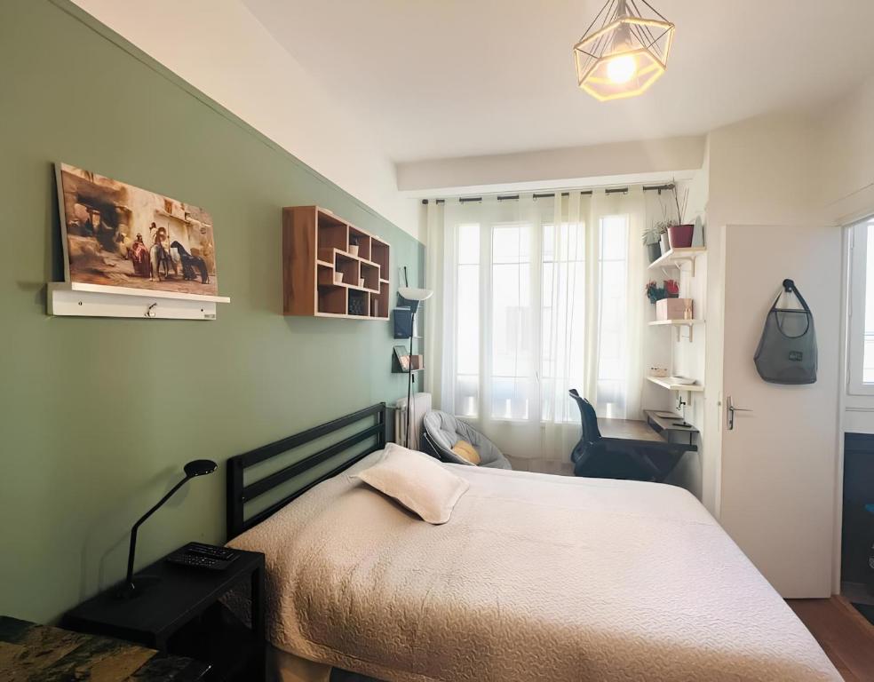 Llit o llits en una habitació de Tie-Break Studio