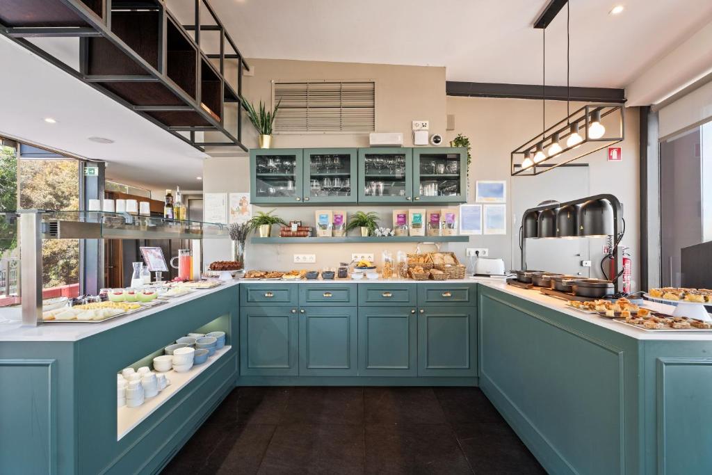 A bright bakery-style breakfast room with a self-service counter.