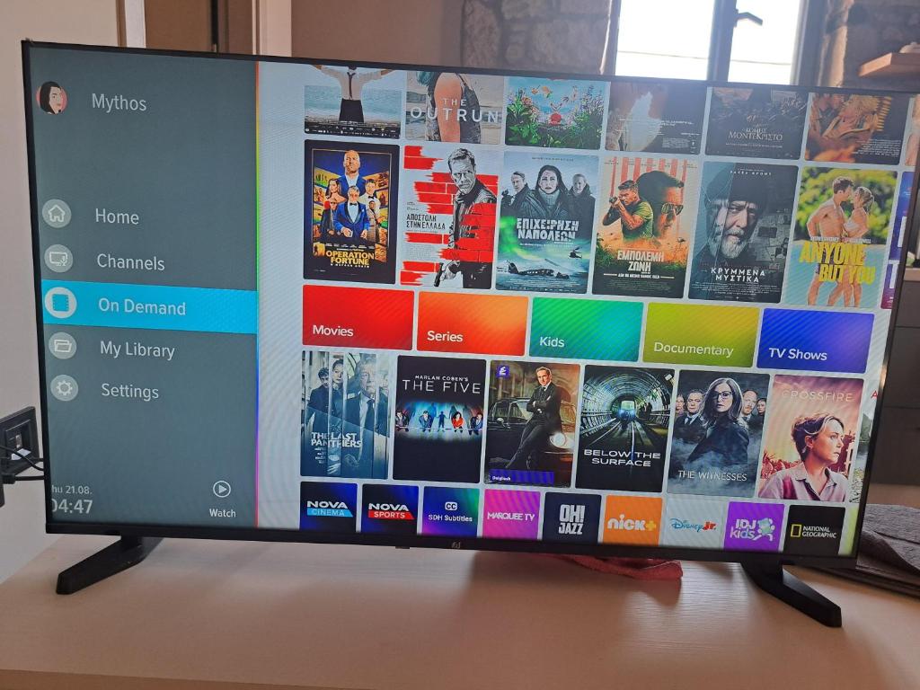 TV a/nebo společenská místnost v ubytování Mythos Home