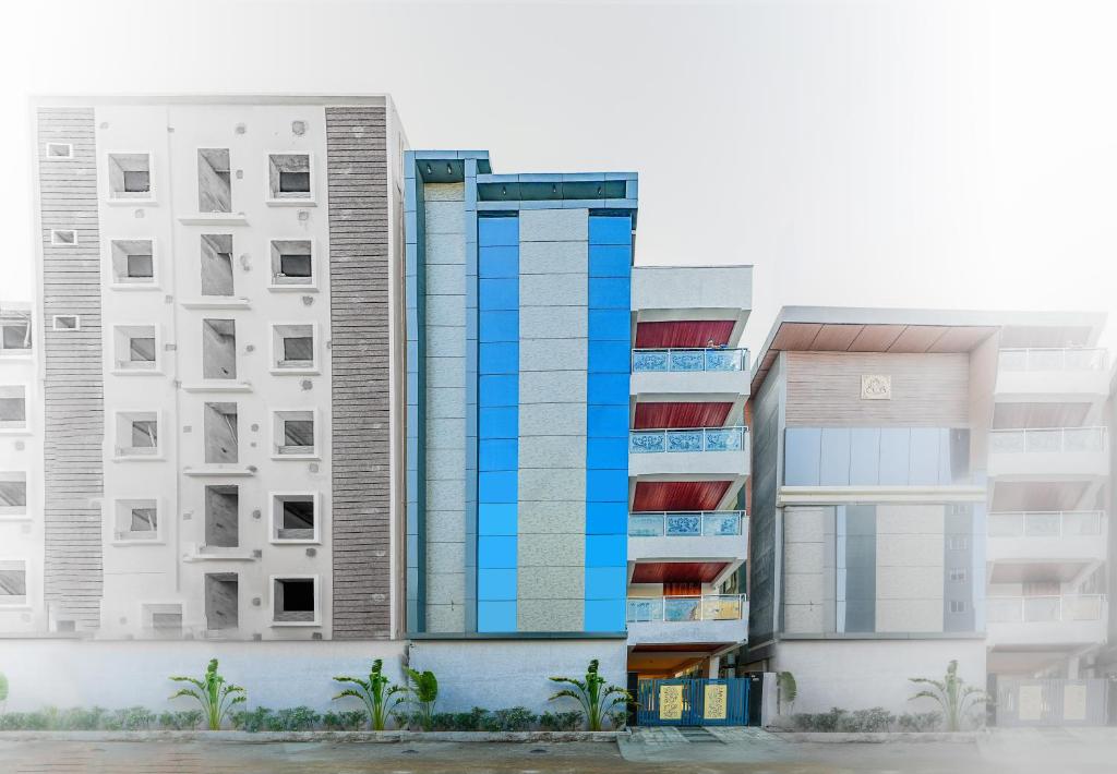 a rendering of two apartment buildings with balconies at Shreshtam Apart Hotel, Gachibowli in Hyderabad
