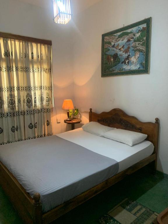 Ένα ή περισσότερα κρεβάτια σε δωμάτιο στο Euphoria Dorm