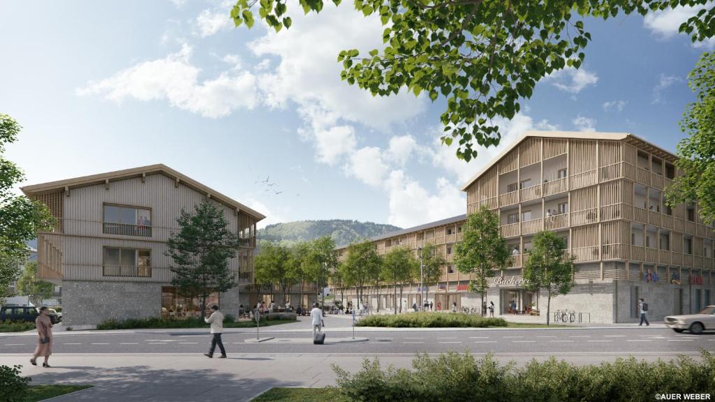 a rendering of a building with people walking in the street at Alpensonne Apartments in Bad Wiessee