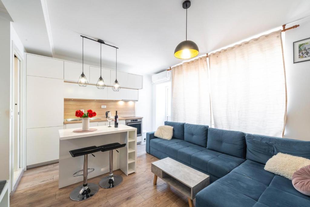 Kuchyň nebo kuchyňský kout v ubytování Modern Studio Apartman
