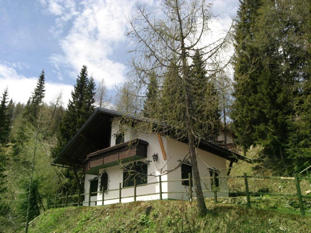 a house on top of a hill in the woods at Chalet Nassfeld nahe Skipisten in Sonnenalpe Nassfeld