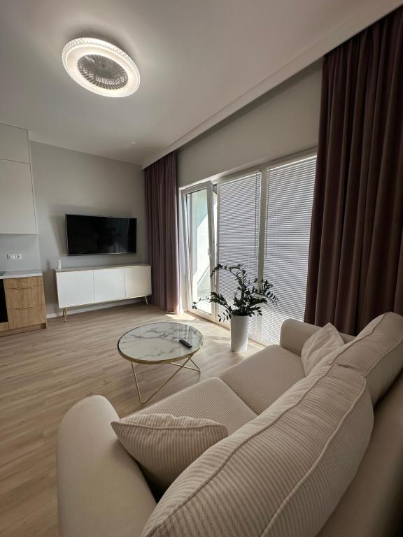 Televisyen dan/atau pusat hiburan di Apartament Magiczny Horyzont