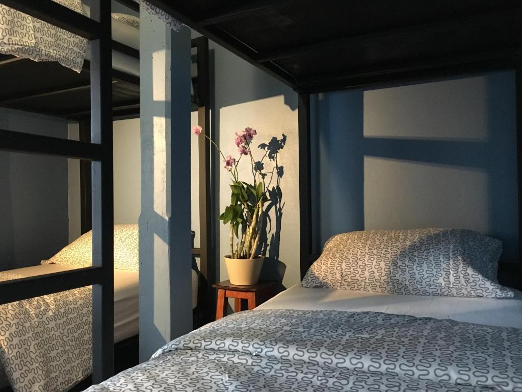 Postel nebo postele na pokoji v ubytování Blue Chang House