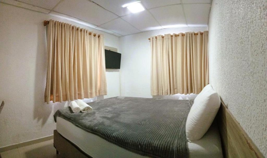 Ένα ή περισσότερα κρεβάτια σε δωμάτιο στο Hotel Porto Boa Viagem