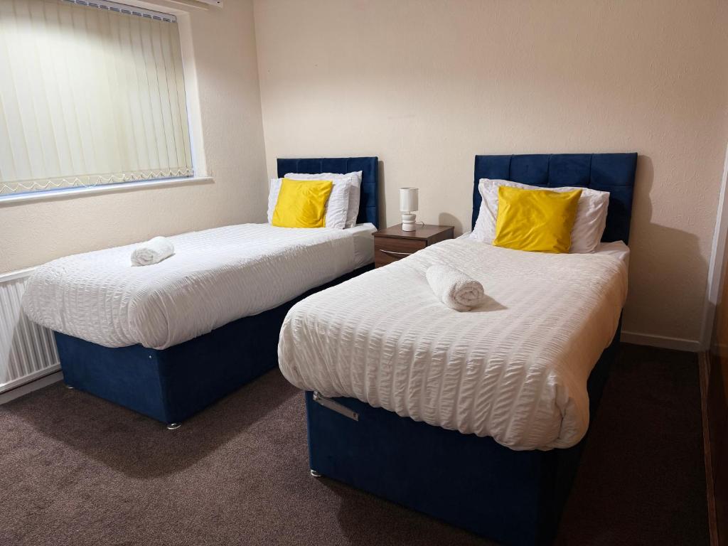 Katil atau katil-katil dalam bilik di Lovely 3 Bed House in Oadby-Leicester