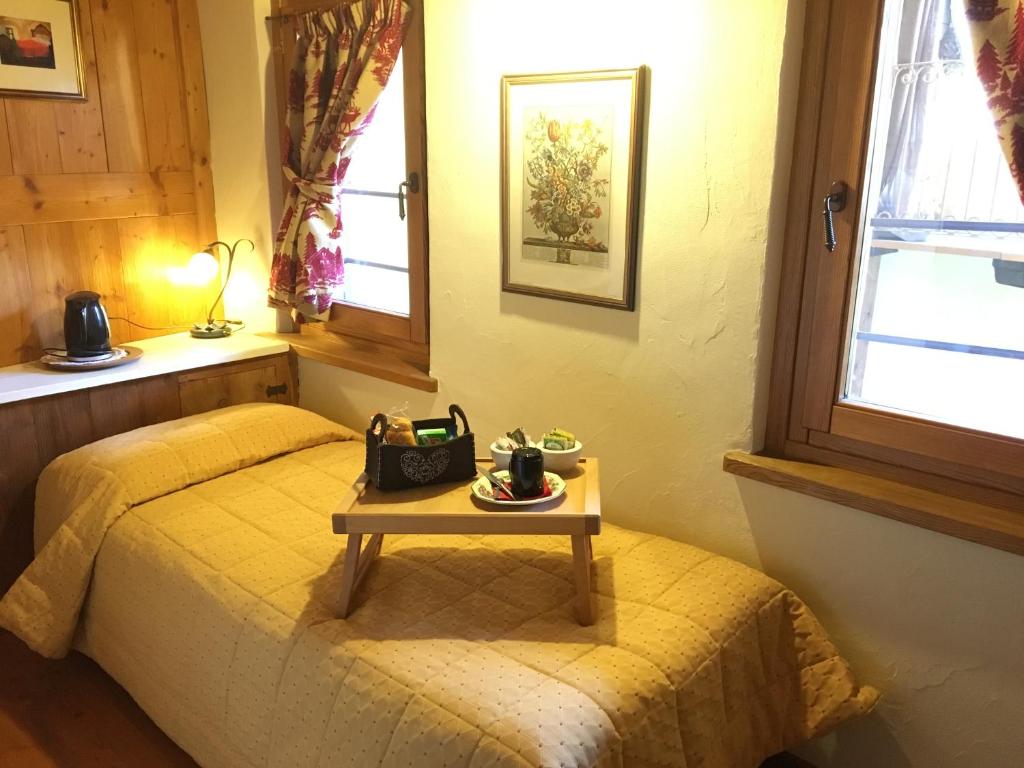 Postel nebo postele na pokoji v ubytování Maison Colombot