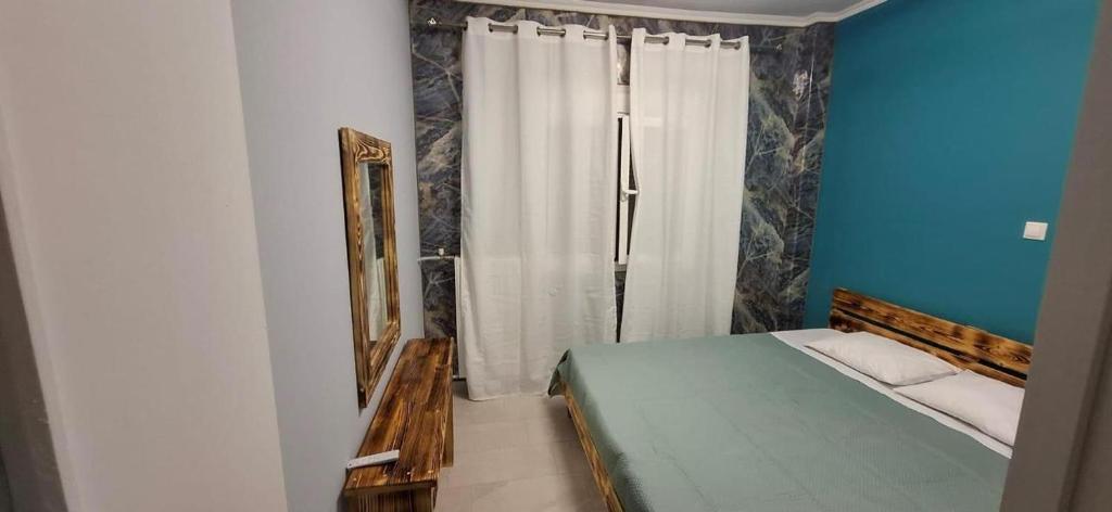 Postel nebo postele na pokoji v ubytování Lilia Apartments