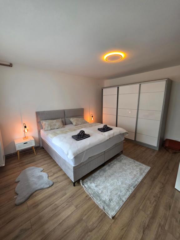 En eller flere senge i et værelse på Apartman Omerovic - Panon Centar Tuzla