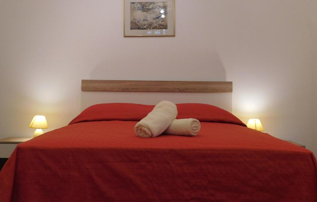 Postel nebo postele na pokoji v ubytování Central Apartments Circolo