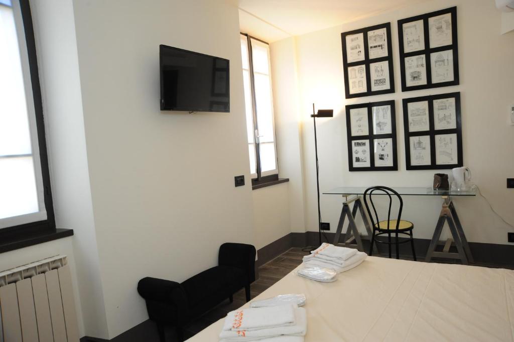 Postel nebo postele na pokoji v ubytování La Mainolda B&B