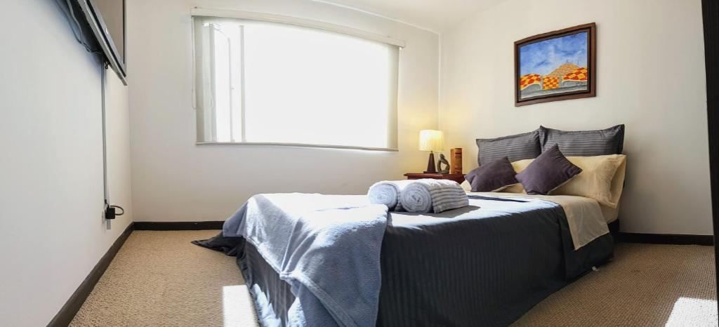 Postel nebo postele na pokoji v ubytování Habitación Privada en Apartamento en Bogotá Norte