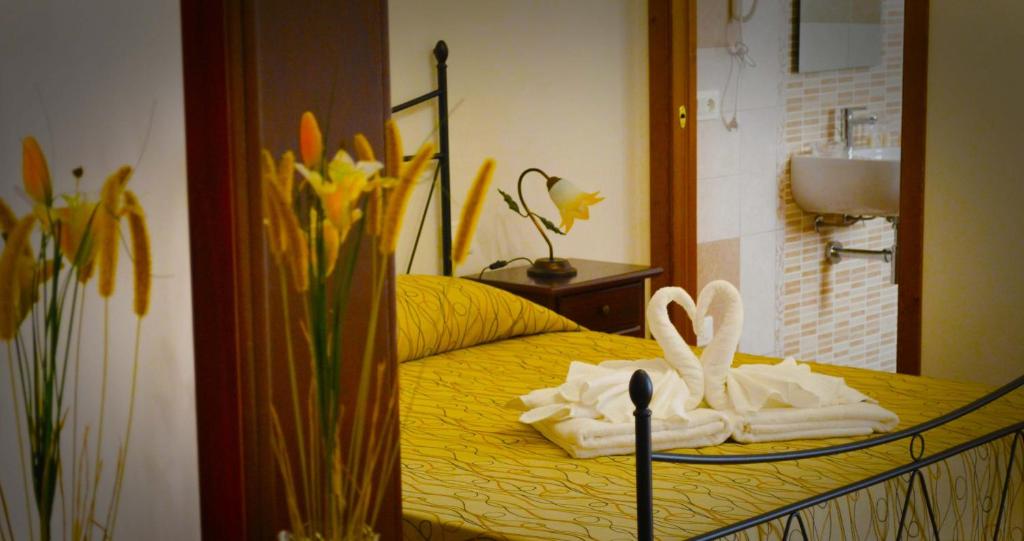 Postel nebo postele na pokoji v ubytování B&B Castiglione