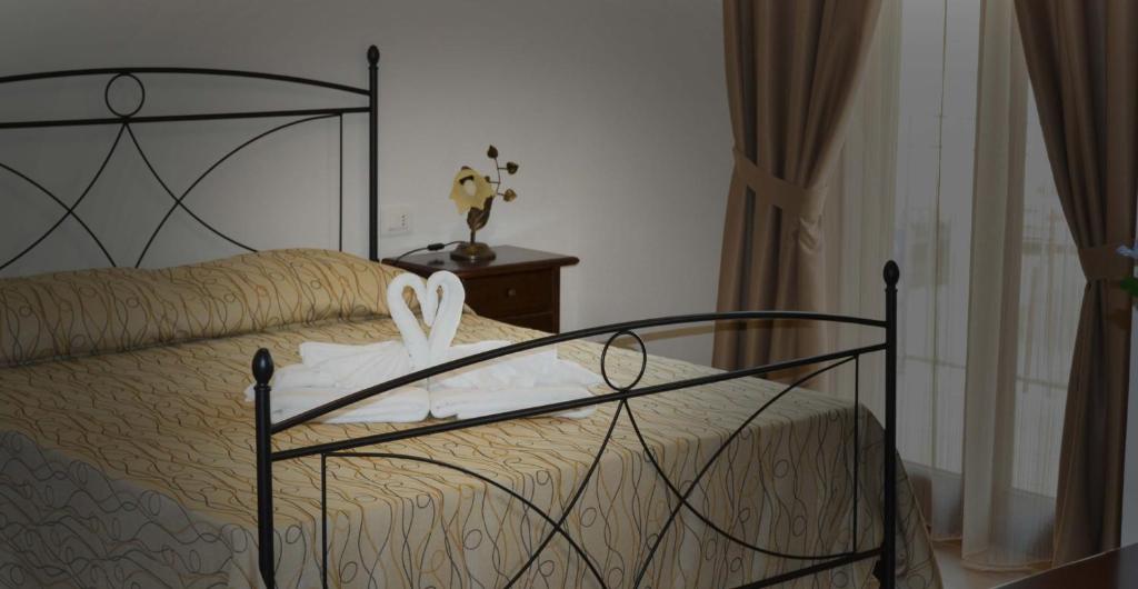 Postel nebo postele na pokoji v ubytování B&B Castiglione