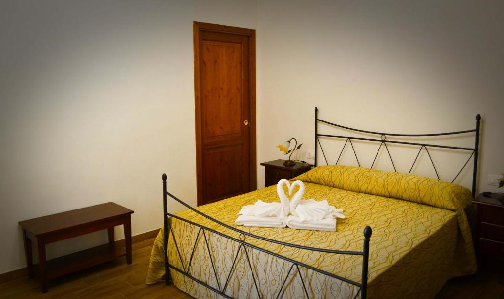 Postel nebo postele na pokoji v ubytování B&B Castiglione