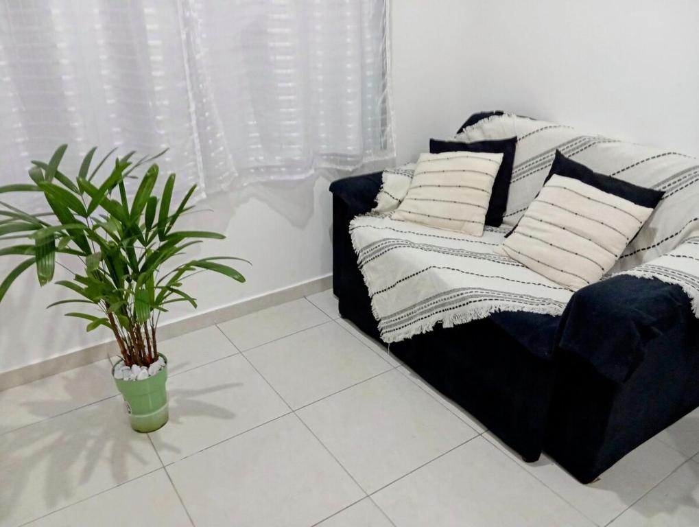 Χώρος καθιστικού στο Apartamento com estacionamento no local