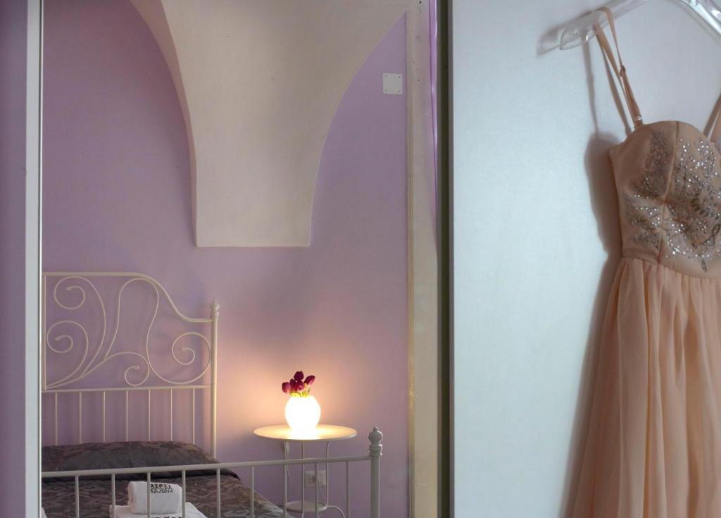 Łóżko lub łóżka w pokoju w obiekcie B&B Favola Mediterranea