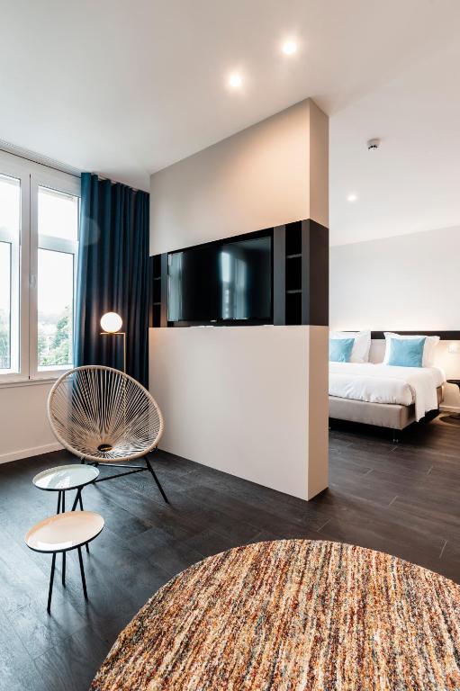 Postel nebo postele na pokoji v ubytování Hotel Portinari