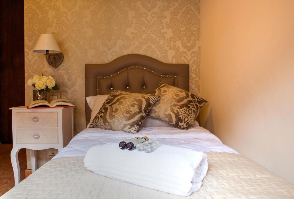 Postel nebo postele na pokoji v ubytování Hotel Ares Milano