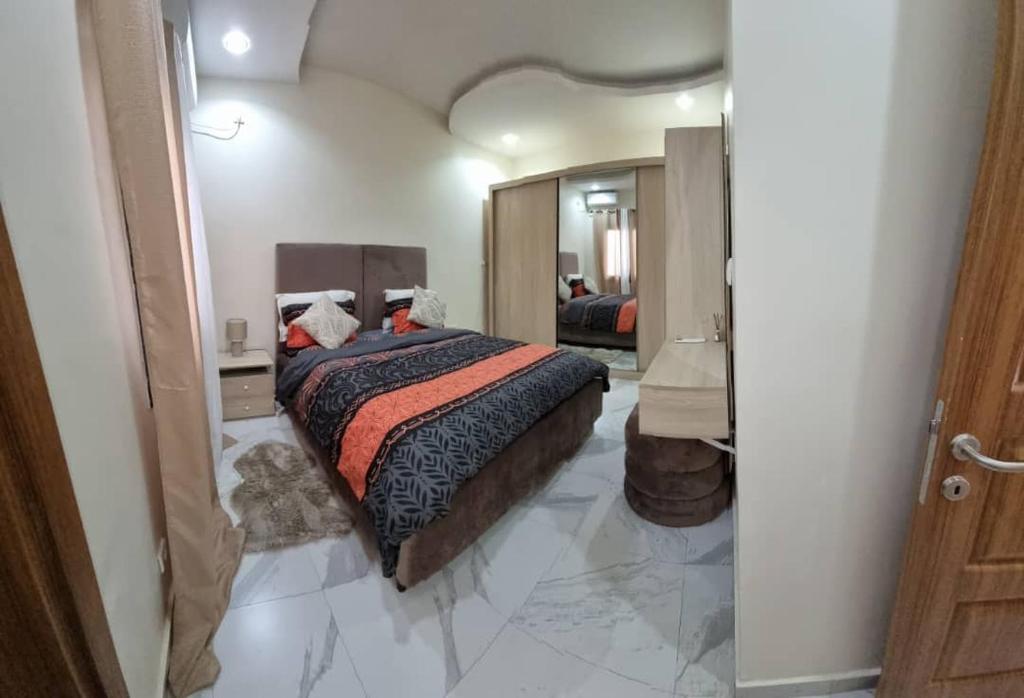 Ένα ή περισσότερα κρεβάτια σε δωμάτιο στο le petit Suxalikay - Appartement F3 haut standing - Sipres VDN