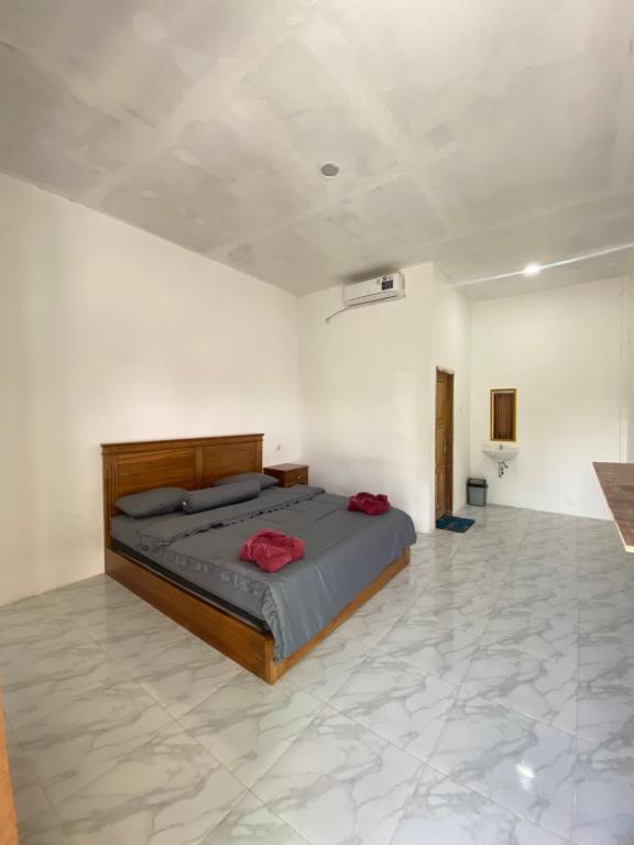 Ένα ή περισσότερα κρεβάτια σε δωμάτιο στο New Chez Felix