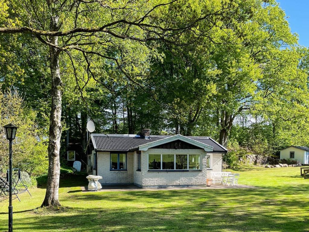 a small house in the middle of a yard at 5 person holiday home in KLIPPAN-By Traum in Hagstad