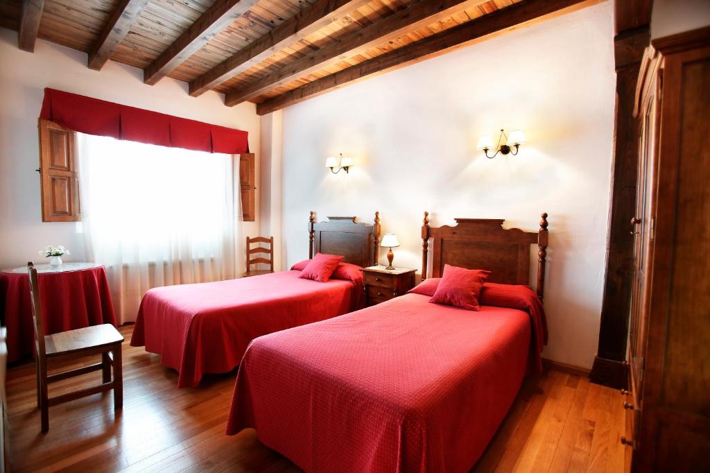 Posteľ alebo postele v izbe v ubytovaní Casa Rural El Regajo Valle del Jerte