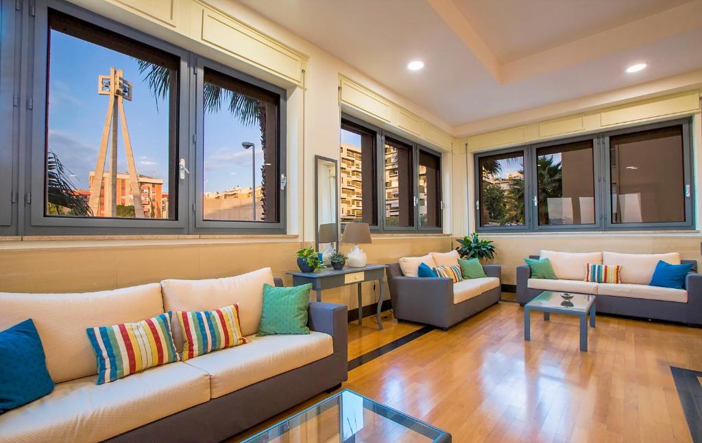 A seating area at Hotel Residence Ulivi E Palme