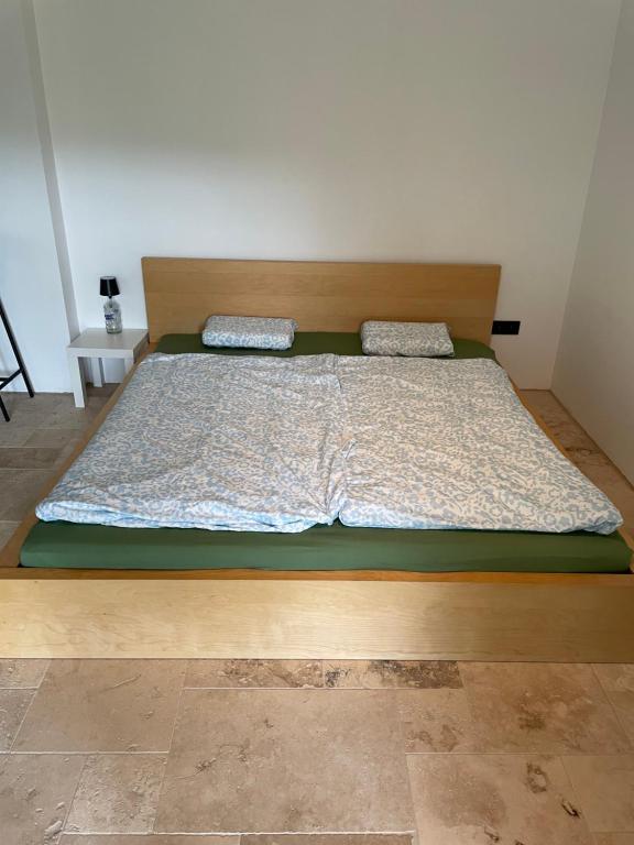 Postel nebo postele na pokoji v ubytování FeWo-Gmunden - TraunLoft -NEU