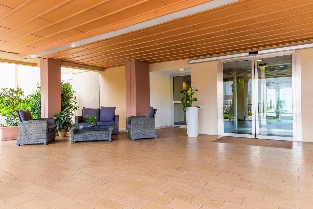 A seating area at Hotel Residence Ulivi E Palme