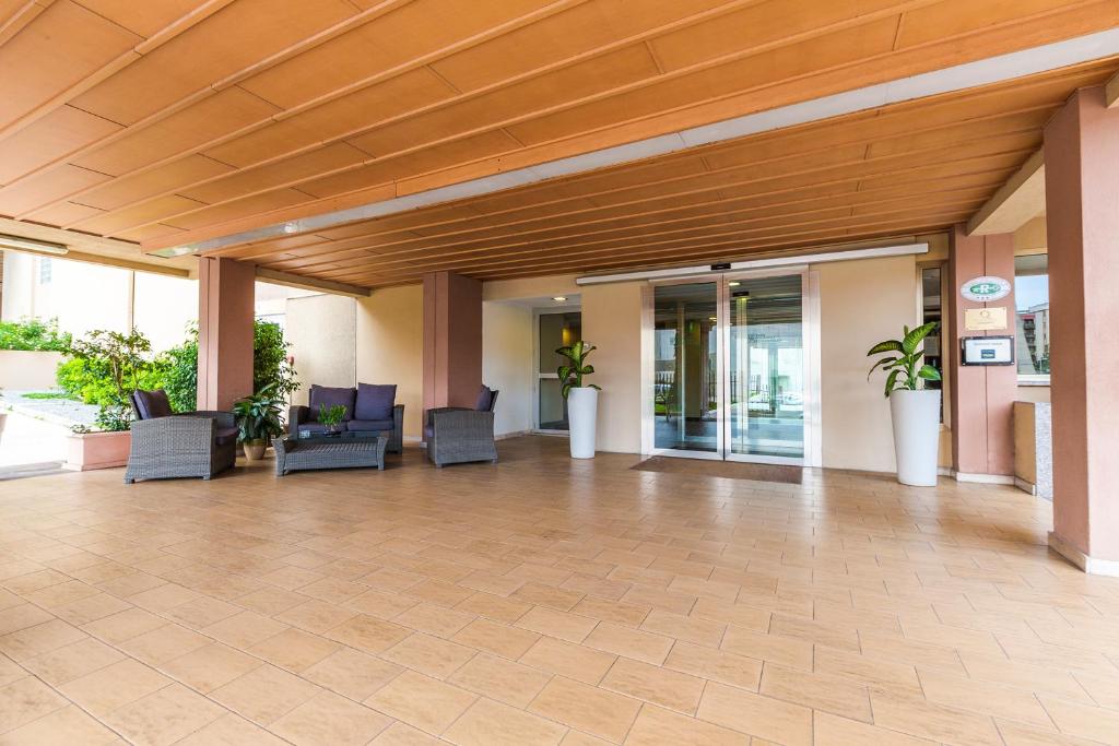 A seating area at Hotel Residence Ulivi E Palme