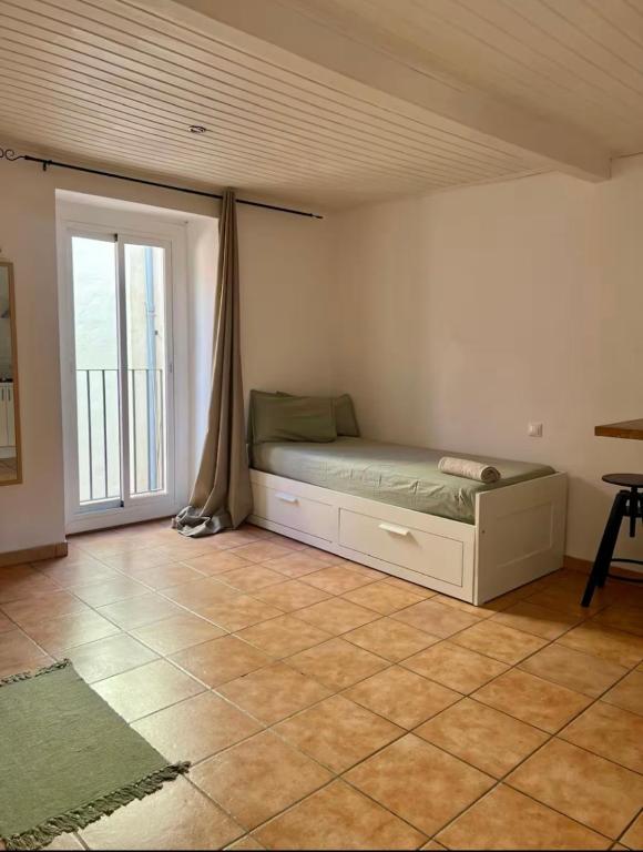 Ένα ή περισσότερα κρεβάτια σε δωμάτιο στο Mediona III