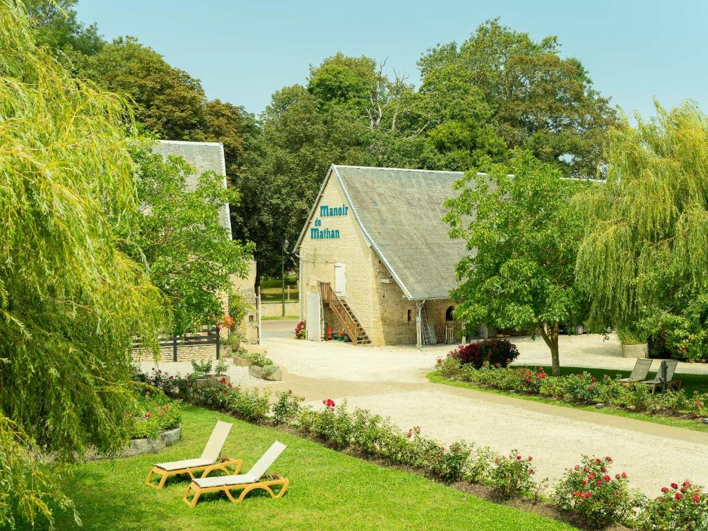 Hôtel Le Manoir De Mathan Crépon à la campagne 5 mn d'Arromanches et 10 mn de Bayeux - 家庭套房