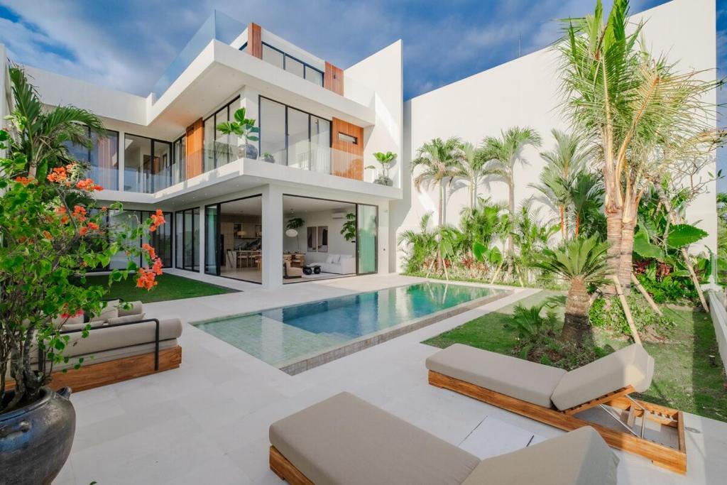 an image of a house with a swimming pool at Exclusive 4BR Villa with Rooftop, Ricefield Views near Cemagi Beach in Cemagi