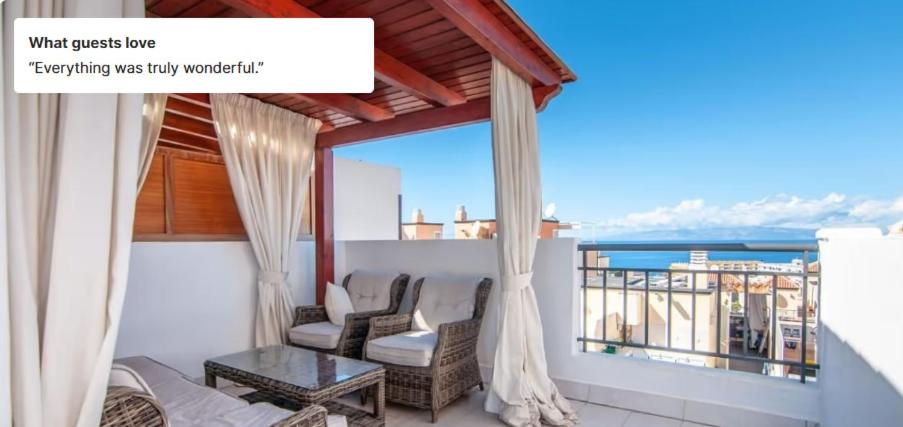 a room with a balcony with a view of the ocean at Two bedroom duplex with pool and ocean view in Costa Adeje in Callao Salvaje