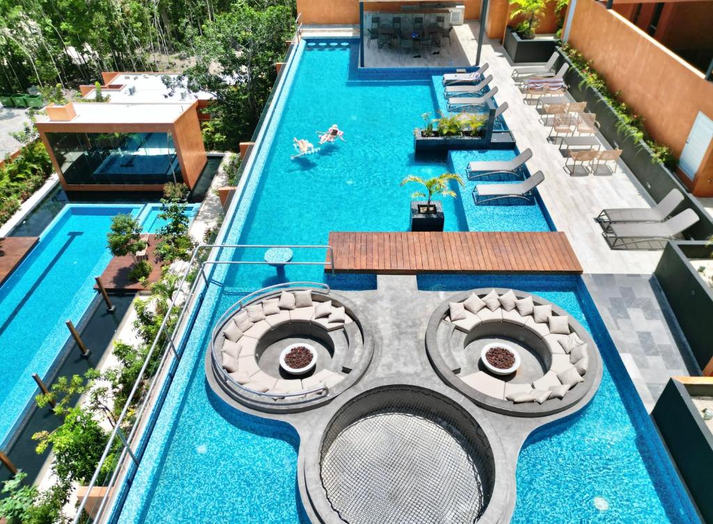 Hồ bơi trong/gần 3BR en Aldea Zama-Roof Top-2 Pool-Fast WiFi-Gym