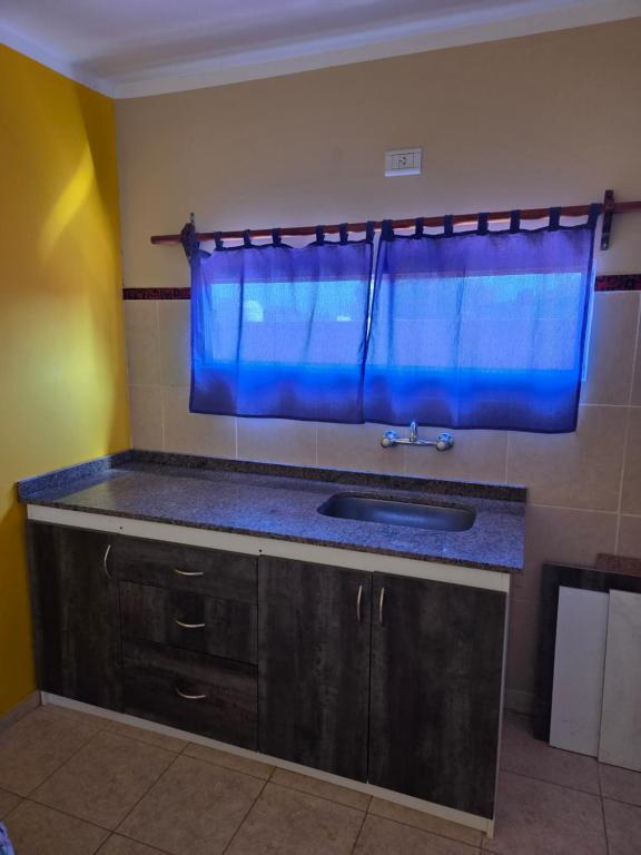 Kuchyň nebo kuchyňský kout v ubytování Luz de luna departamento
