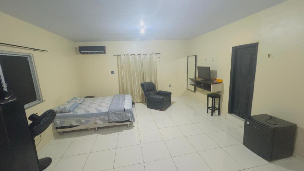 Ένα ή περισσότερα κρεβάτια σε δωμάτιο στο Casa Boaventura COP 30