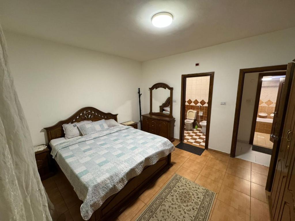 Llit o llits en una habitació de Comfort Apartment