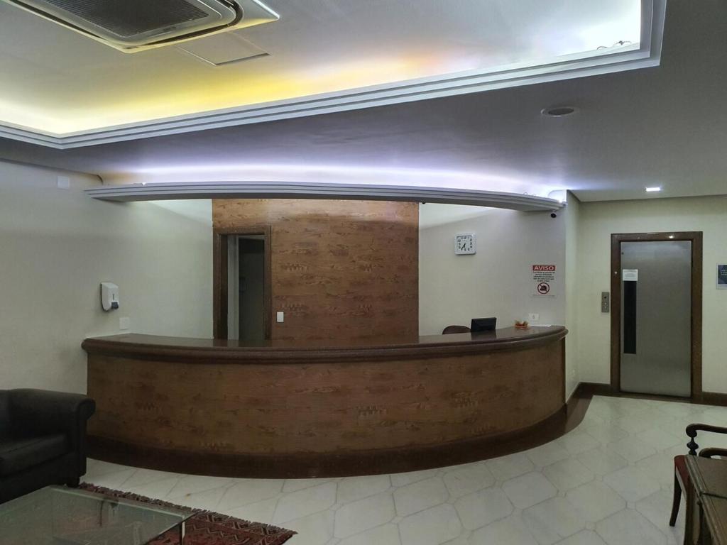 a large lobby with a waiting room with a reception desk at Flat Av Rio Branco Centro SP in Sao Paulo
