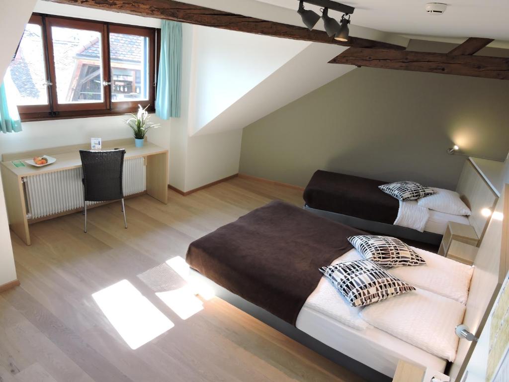 Postel nebo postele na pokoji v ubytování Auberge Communale de St-Légier