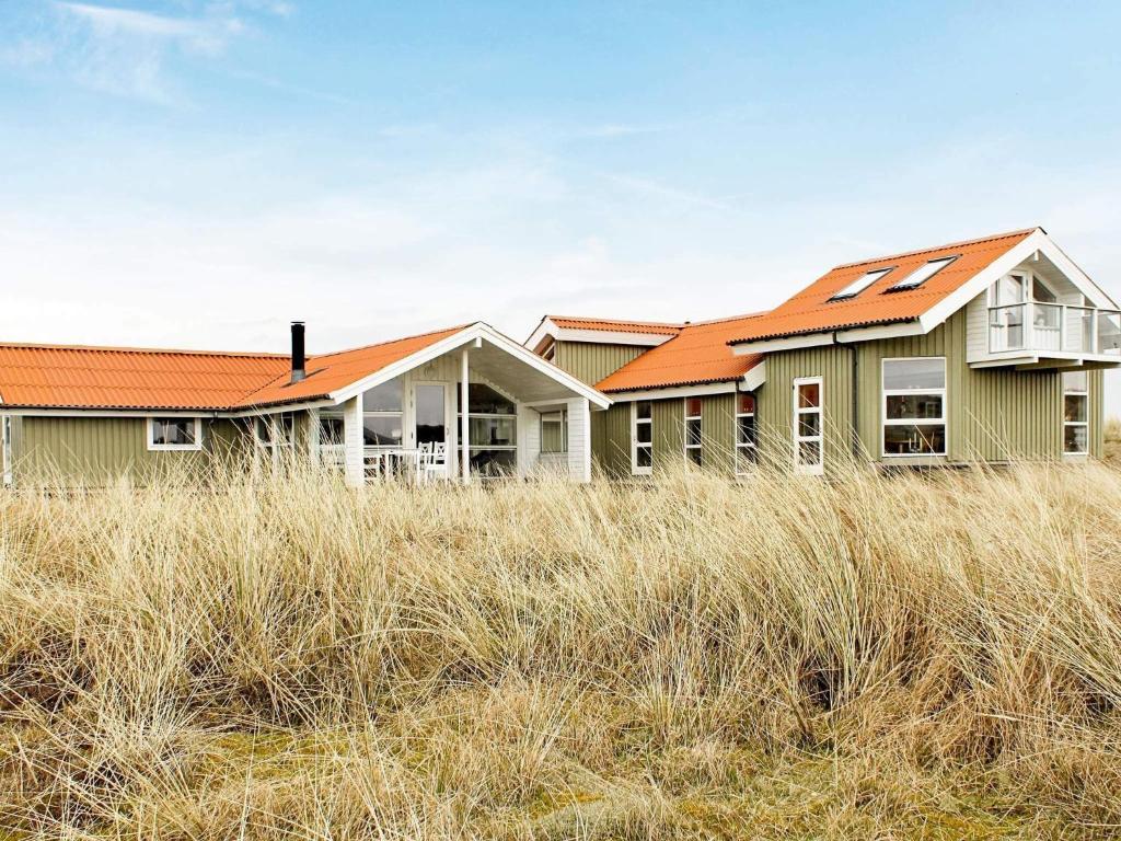 an image of a house with orange roofs at 7 person holiday home in Fanø-By Traum in Fanø