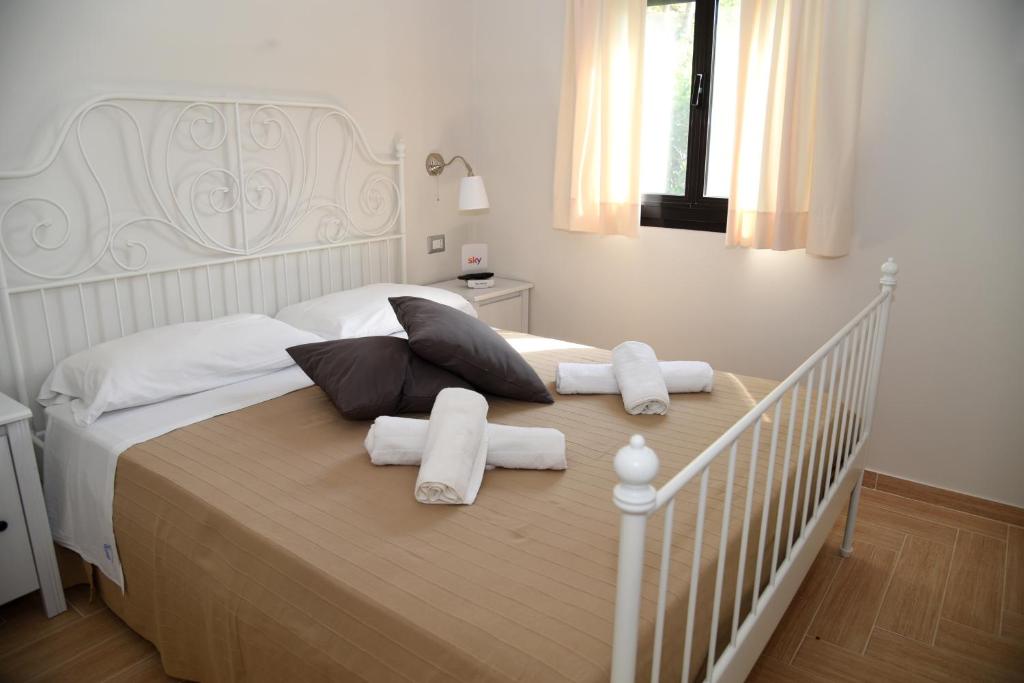 Łóżko lub łóżka w pokoju w obiekcie Agriturismo San Leonardo