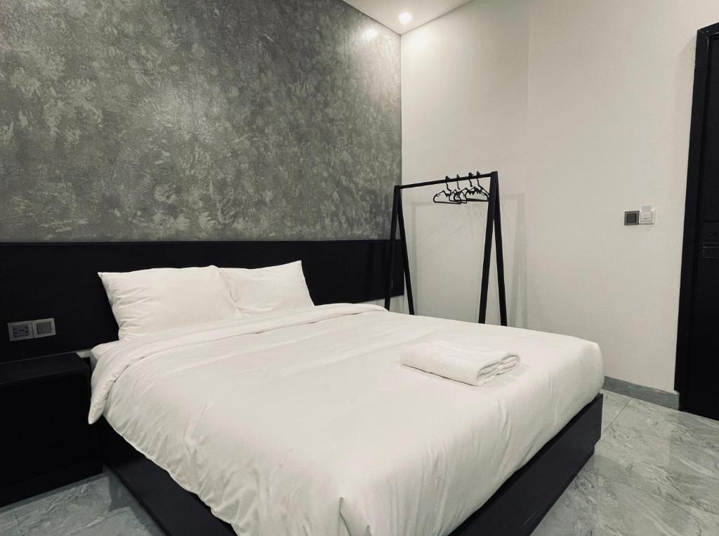 Giường trong phòng chung tại Ben Ben Hotel - Near City Center - Budget Stay